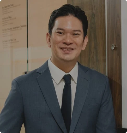 Dr. Thor Timothy stands in front of Novena Pain Management Centre clinic.