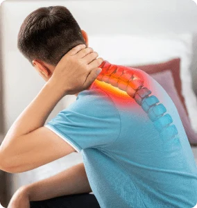 A man holding his neck in pain